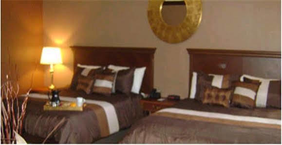 Talbot Trail Inn & Suites Лимингтон Экстерьер фото